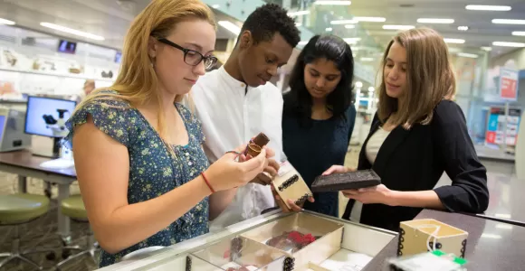 Students examine Museum collection objects as part of a Q?rius school program. Photo by Jennifer Renteria, Smithsonian.