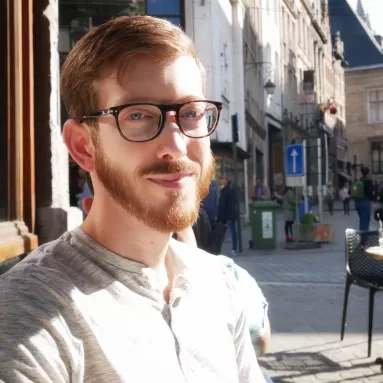 Image of Mike enjoying a morning crepe in Brussels