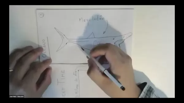 Image of two hands and a fieldbook while a drawing is being drawn onto the fieldbook