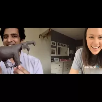 Paleontologist Advait Jukar and host Maggy Benson talk during a Zoom video webinar