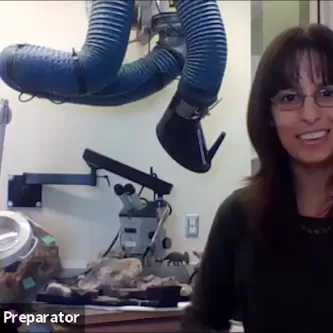 Michelle Pinsdorf in the fossil prep lab.