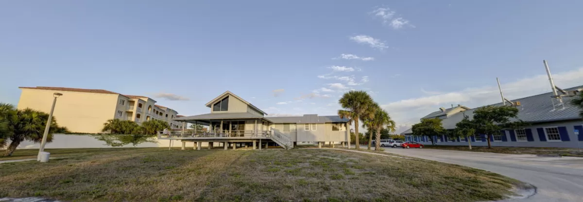 Smithsonian Marine Station entrance, with view of guest house